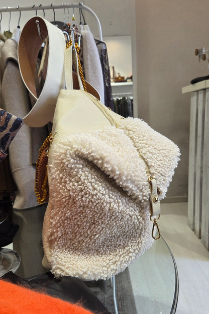 Borsa in pelle e bouclè