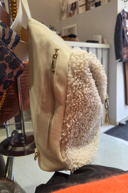 Borsa in pelle e bouclè