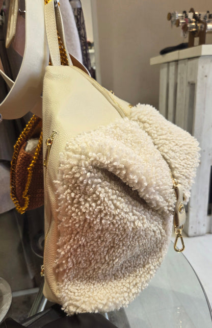 Borsa in pelle e bouclè